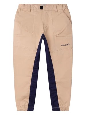 Zdjęcie produktu Timberland Spodnie w kolorze beżowym rozmiar: 104