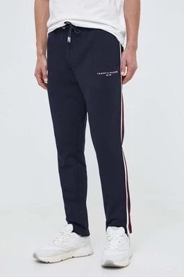 Zdjęcie produktu Tommy Hilfiger spodnie dresowe bawełniane kolor granatowy z aplikacją