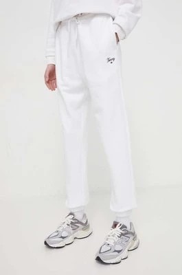 Zdjęcie produktu Tommy Jeans spodnie dresowe bawełniane kolor biały gładkie DW0DW17771