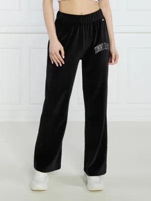 Zdjęcie produktu Tommy Jeans Spodnie dresowe TJW RHINESTONE VELOUR SWEATPANT | Relaxed fit