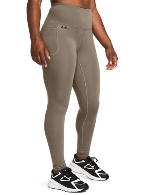 Zdjęcie produktu Under Armour Legginsy sportowe "Motion" w kolorze khaki rozmiar: S