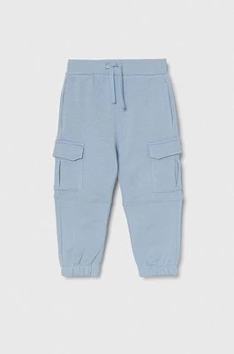 Zdjęcie produktu United Colors of Benetton spodnie dresowe bawełniane dziecięce kolor niebieski gładkie